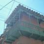 Bolivie - Un des nombreux balcons en bois de la ville